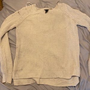 It is a tan sweater. I got it from rue21 and it is very comfortable.